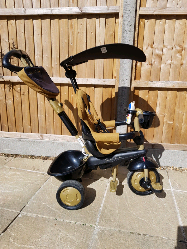 smart trike black and gold